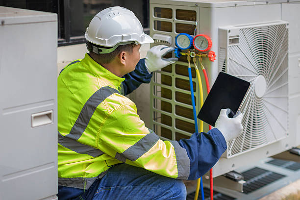 Professional Hvac technician working in Elwood, UT